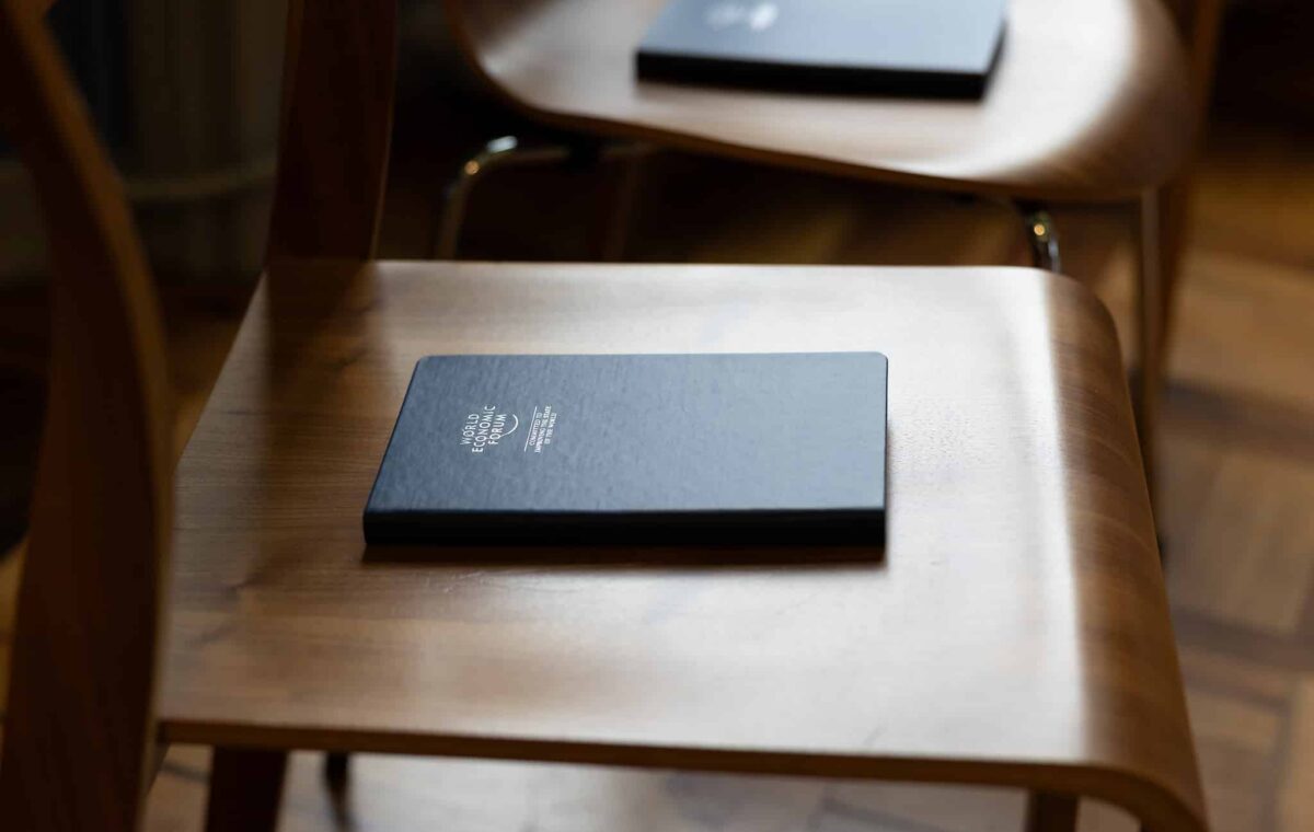 A notebook on a table at the World Economic Forum at Davos in 2025