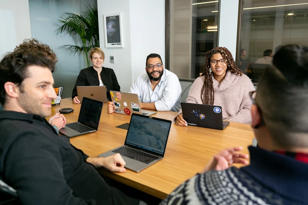A startup team in a board meeting — employee equity and option pools in European startups