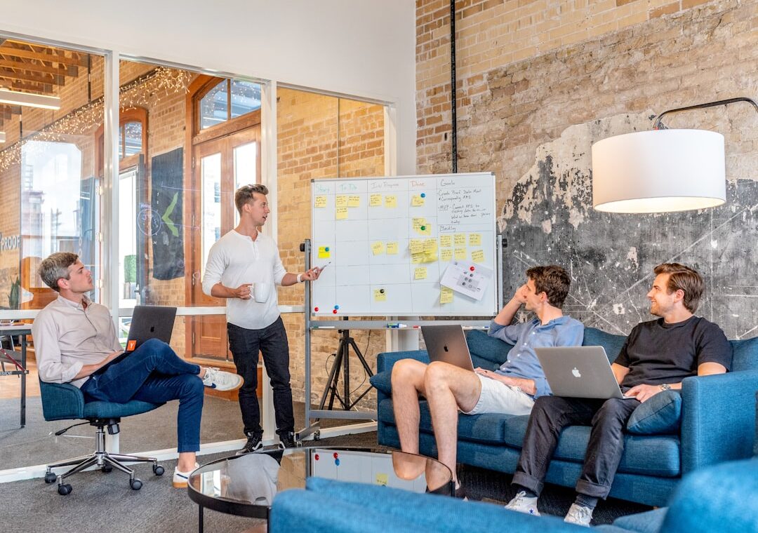 Founder pitching to investors at a whiteboard, the core activity of a European pre-seed fundraise