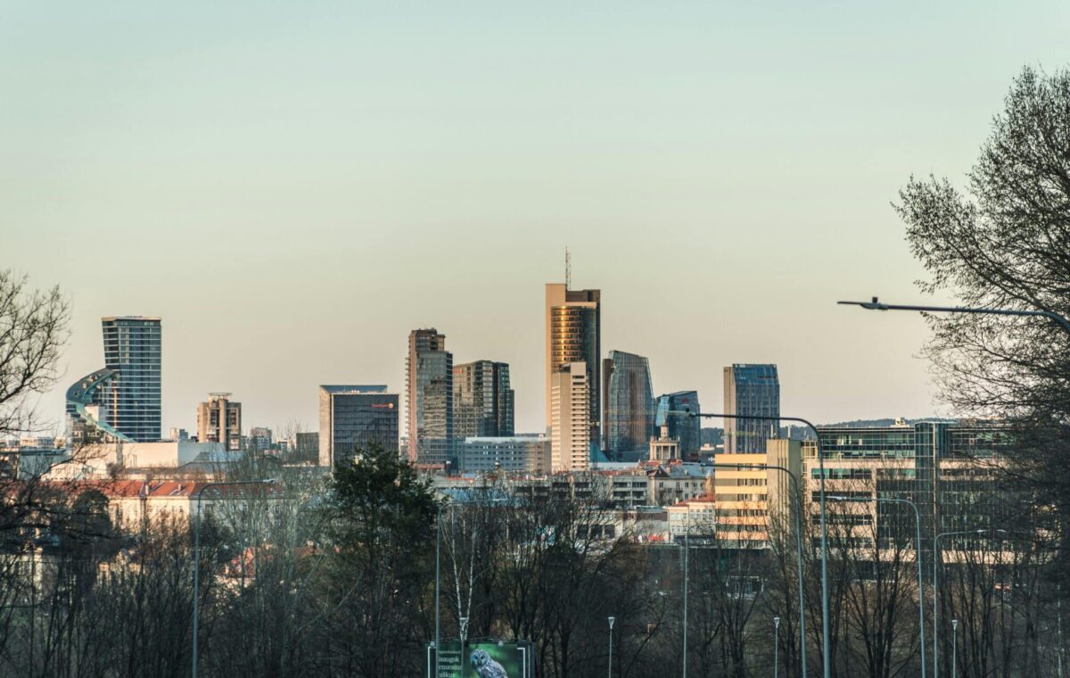 High rise buildings in Vilnius Lithuania during daytime by Dovydas Zilinskas