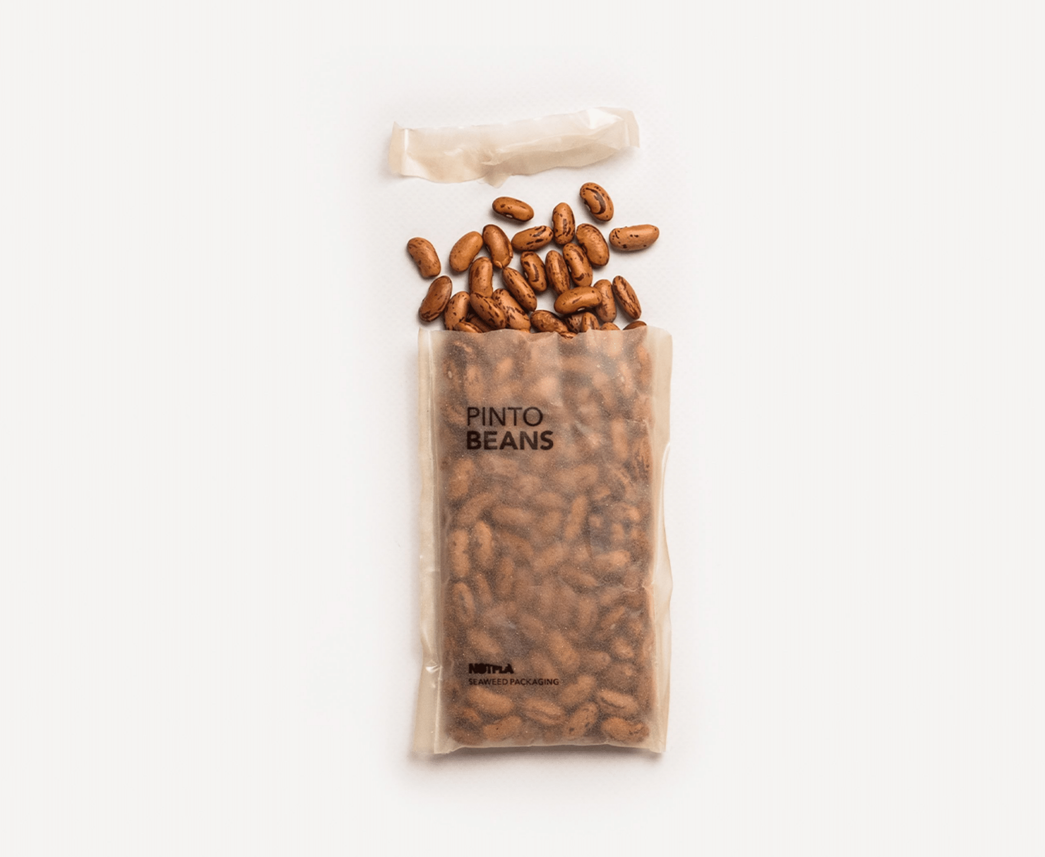 An image of Notpla's packaging used to package a bag of Pinto beans.